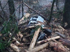 Dozens of vehicles were trapped Sunday night between two landslides on Highway 7 near Agassiz, B.C.