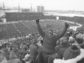 Half-time photo from bleachers at McMahon Stadium, during the first Grey Cup game played on the Prairies, in Calgary. Crowd members at the game were excited despite the cold. Calgary Herald archives