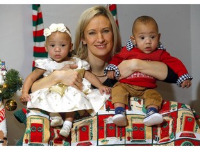 Mom Megan Campbell with her twins L-R, Faith and Lincoln, says the NorthernStar Mother's Milk Bank (a Christmas Fund charity) was a lifesaver for her.  Darren Makowichuk/Postmedia