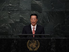 (FILES) This file photo taken on April 22, 2016 shows China's Vice Premier Zhang Gaoli addressing the United Nations Opening Ceremony of the High-Level Event for the Signature of the Paris Agreement in New York.
