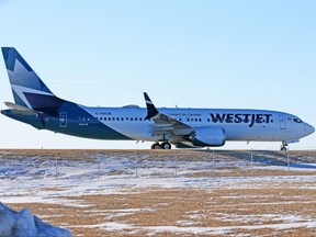 A WestJet Boeing 737MAX taxis back to the WestJet hangers after a training flight on Thursday, January 14, 2021.