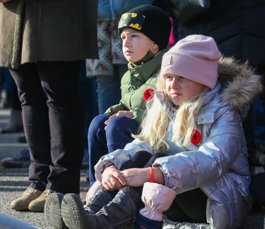 Children watch the Remembrance Day ceremonies at the Military Museums on Thursday, November 11, 2021. 

Gavin Young/Postmedia