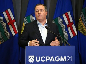 Alberta Premier Jason Kenney speaks during a press conference at the end of the UCP annual general meeting on Sunday, November 21, 2021.