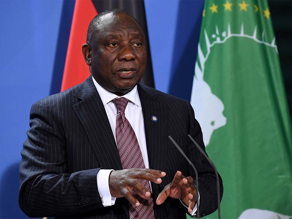  FILE PHOTO: South African President Cyril Ramaphosa addresses a press conference after the G20 Compact with Africa conference at the Chancellery in Berlin, Germany August 27, 2021.
