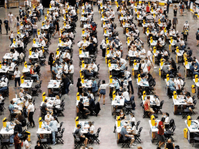 People attend a COVID-19 mass vaccination clinic in Toronto in June. More than 59 million doses of COVID-19 vaccines have been administered in Canada. Nationally, as of Oct. 29, there had been just over 22,200 reports of adverse reactions following immunization; of those, 5,653 were reported as serious.