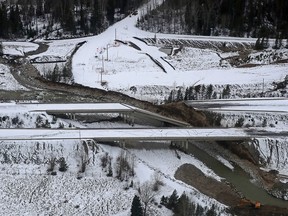 Damage caused by heavy rains and mudslides is shown in this aerial photo along the Coquihalla Highway south of Merritt, B.C., on Monday, Nov. 22, 2021.