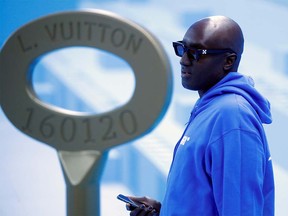 FILE PHOTO: Designer Virgil Abloh is seen before his Fall/Winter 2020 collection show for fashion house Louis Vuitton during Men's Fashion Week in Paris, France, January 16, 2020.