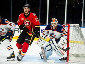 Stockton Heat centre Adam Ruzicka, here hanging around the Bakersfield Condors’ crease, is off to a superb start to his third season in the American Hockey League. (Courtesy of Stockton Heat.)