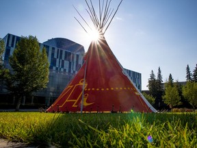 Morning suns shines above a Blackfoot teepee on the University of Calgary campus on Tuesday, August 31, 2021. The teepee was designed by Reg Crowshoe, a Piikani Nation elder and U of C Indigenous strategy adviser, to welcome both Indigenous and non-Indigenous students to campus.