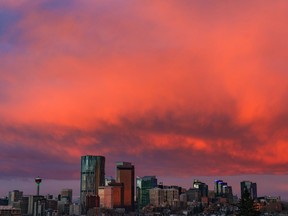 It was a stunning sunrise as clouds glow over the downtown Calgary skyline on Wednesday, Nov. 3, 2021.
