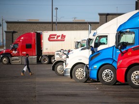Numerous trucks fill the lot at the Roadking Truck Stop in Calgary on Wednesday, November 17, 2021 as drivers waited to see if flood damaged roads in British Columbia will reopen.