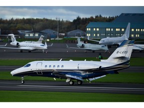 A private jet lands in Prestwick Airport, as world leaders gather in Glasgow for the UN Climate Change Conference (COP26), in Prestwick, Scotland, Britain, November 2, 2021.