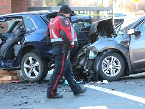 Calgary police on the scene of a fatal crash at 17th Avenue and 29th Street S.W. on Monday, Nov. 8, 2021.