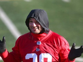 Stampeders kicker Rene Paredes shares a light moment with teammates during practice at McMahon Stadium on Wednesday.