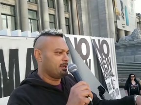 File photo: Makhar Singh Parhar speaks at an anti-mask rally in downtown Vancouver.