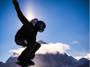 A snowboarder takes to the air at Lake Louise west of Calgary. Al Charest / Postmedia