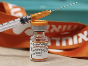 A vial of the Pfizer/BioNTech Covid-19 vaccine for children is pictured at the Meuhedet Healthcare Services Organisation in Tel Aviv on November 22, 2021, as Israel begins coronavirus vaccination campaign for 5 to 11-year-olds.