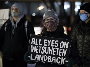 Demonstrators rally against in their fight against the Coastal GasLink Pipeline in Alberta, on Monday, Nov. 22.