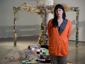 Artist Maya Beaudry poses for a photo with her art The Pergola at Contemporary Calgary on Wednesday, November 3, 2021. Azin Ghaffari/Postmedia