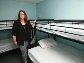 Heather Morley, executive director for Inn from the Cold, poses in a family space in Calgary. Jim Wells/Postmedia