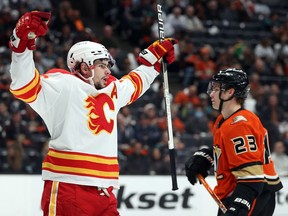 The Calgary Flames’ Sean Monahan celebrates a goal against the Anaheim Ducks at Honda Center in Anaheim, Calif., on Friday, Dec. 3, 2021.
