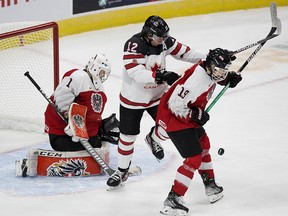 Team Canada battles Team Austria on Tuesday.