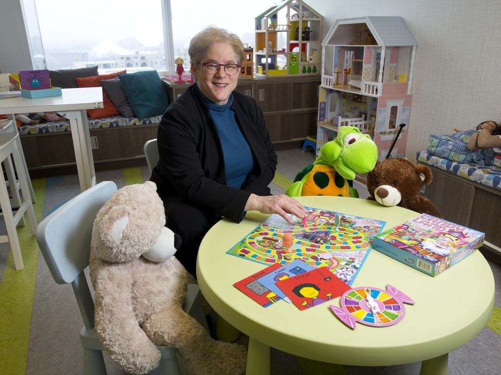  Dr. Robbie Babins-Wagner, CEO of the Calgary Counselling Centre in the children’s room.