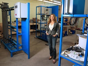 Amanda Hall, CEO of Summit Nanotech, stands in one of her company's green lithium extraction labs in Calgary on Sunday, December 5, 2021. Hall was announced as the $1-million grand prize winner of the Impact Canada Women in Cleantech Challenge.