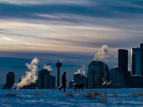 Steam and late afternoon winter light convey the cold of another frigid day in Calgary on Wednesday, December 29, 2021.
