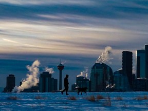 Steam and late afternoon winter light convey the cold of another frigid day in Calgary on Wednesday.