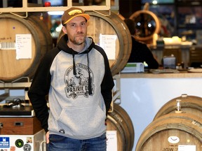 Jay Potter, co-owner of Prairie Dog Brewing, poses inside the restaurant and brewery. They had to cancel the organization of their New Year's celebration due to health restrictions. Thursday, December 30, 2021.