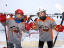 LR, Ahmad Farad and Mirco Dufor of the Airdrie Storm were pumped to play hockey after being delayed a day by cold weather during the third annual Tim Hortons Western Canada Pond Hockey Championships, which - with more than 50 teams participating - took place have on the lake in Chestermere.  The tournament runs from December 28-30.  Photo taken on Tuesday, December 28, 2021.