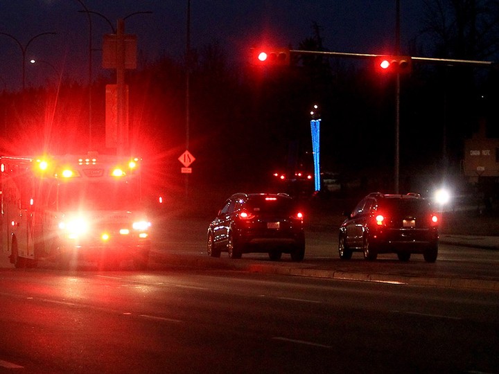  An ambulance responding to an emergency drives along 14th Street S.W. on Sunday, Nov. 28, 2021.