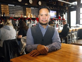 Ernie Tsu, owner of Trolley 5 and head of Alberta Hospitality Association in Calgary on Wednesday, December 22, 2021.
