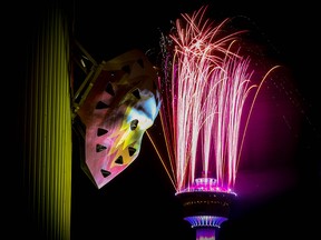 The city's fireworks show above the Calgary Tower on Jan. 1, 2019, as viewed from the Saddledome.