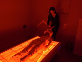Getting red light therapy on the LightStim LED bed. Courtesy, Aeon Future Health