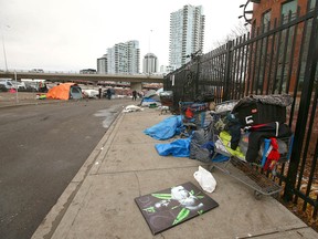 Personal possessions of residents are shown outside the Drop-In Centre in downtown Calgary on Thursday, Dec. 2, 2021.