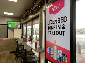 Liquor store industry advocates are concerned more Alberta convenience stores may begin selling alcohol after a 7-Eleven at 14110 127 St. NW in north Edmonton began dine-in and take-out sales this week. Photo Dec. 7, 2021. Greg Southam, Postmedia