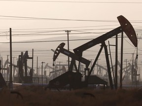 Some pumpjacks operate while others stand idle in the Belridge oil field on November 03, 2021 near McKittrick, California.