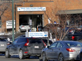 The drive-thru COVID testing clinic at the Richmond Road Diagnostic and Treatment Centre in Calgary was busy on Monday, Dec. 20, 2021.