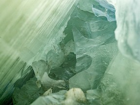 Ice looks green underneath an ice ridge on frozen Keho Lake near Nobleford, Ab., on Monday, January 17, 2022.