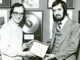 Mel Shaw, left, received an award from MCA Canada in 1973. Courtesy, Stampeders.