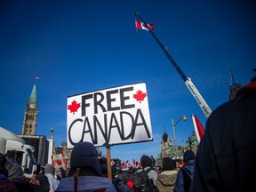 Freedom Convoy protesters gather on Parliament Hill and downtown Ottawa on Sunday, Jan. 30, 2022