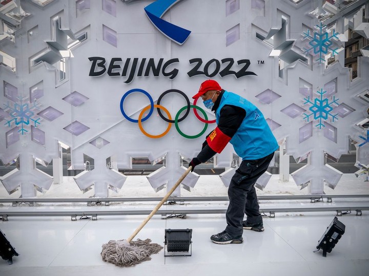  A volunteer cleans a sculpture about Beijing 2022 Winter Olympics on January 23, 2022 in Beijing, China