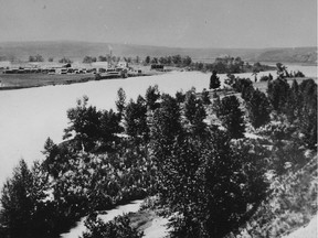 A photo of the Eau Claire Lumber Mill, taken from Center Street (north of downtown) looking west.  Calgary Herald archives.