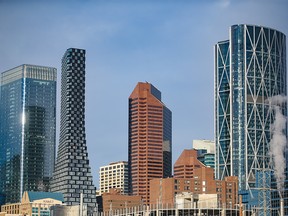 If you want to advance your career, you must return to the office, advises Scott Crockatt. Downtown office towers are seen from Calgary’s East Village on Thursday, January 13, 2022.