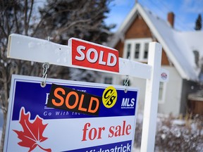 A real estate sign in Elbow Park in Calgary was photographed on Wednesday, January 5, 2022.