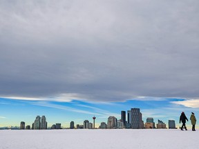 The chinook arch over Calgary signalled the end of a prolonged cold snap and some warm weather for a walk on Tom Campbell’s hill, Monday, January 10, 2022.