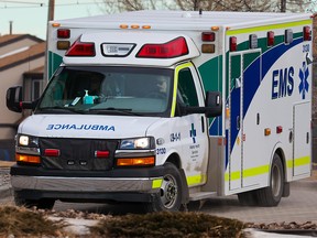 FILE PHOTO: Alberta Health Services ambulances and paramedics are photographed at the Peter Lougheed Center in Calgary on Monday, Jan. 17, 2022.