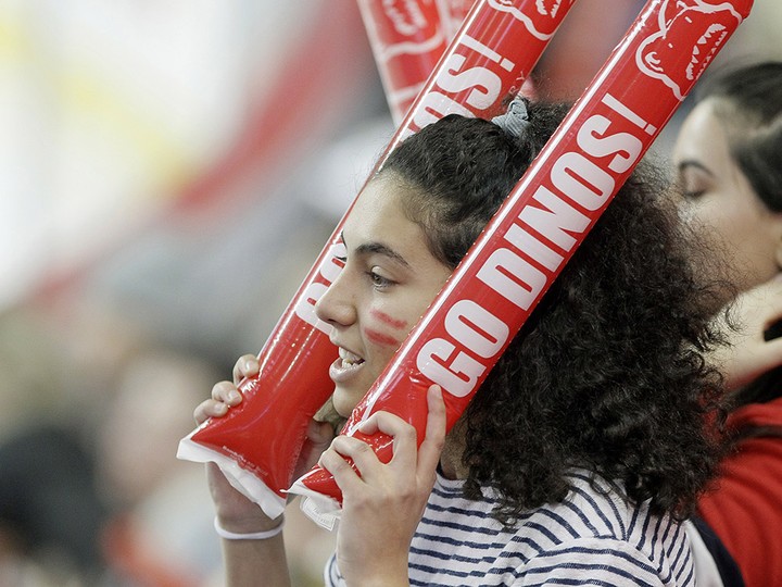  A fan cheers on the University of Calgary Dinos during the Crowchild Classic at the Saddledome on Jan. 30, 2020, before the COVID-19 pandemic.